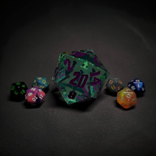An extra large green transparent d20 die with purple numbers sitting in the middle of 6 smaller d20 dice.