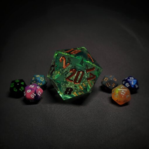 An extra large green transparent d20 die with golden numbers sitting in the middle of 6 smaller d20 dice.