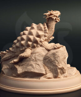A turtle like creature sitting on a rocky base