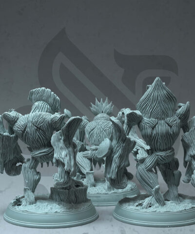 Three tree like characters with the name treant saplings standing on bases.