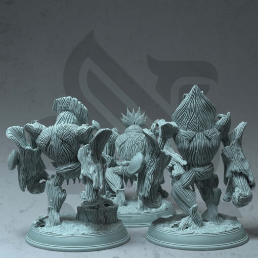 Three tree like characters with the name treant saplings standing on bases.
