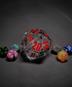 An extra large transparent d20 die with red numbers sitting in the middle of 6 smaller d20 dice.