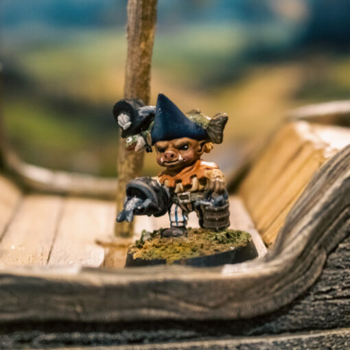 The Cannonier, carrying a bucket of fishy ammunition